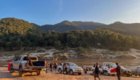 Cars and Travelers Mekong River, Pak Beng, Laos